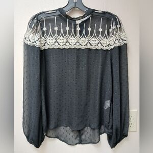 Available black sheer long sleeve shirt
